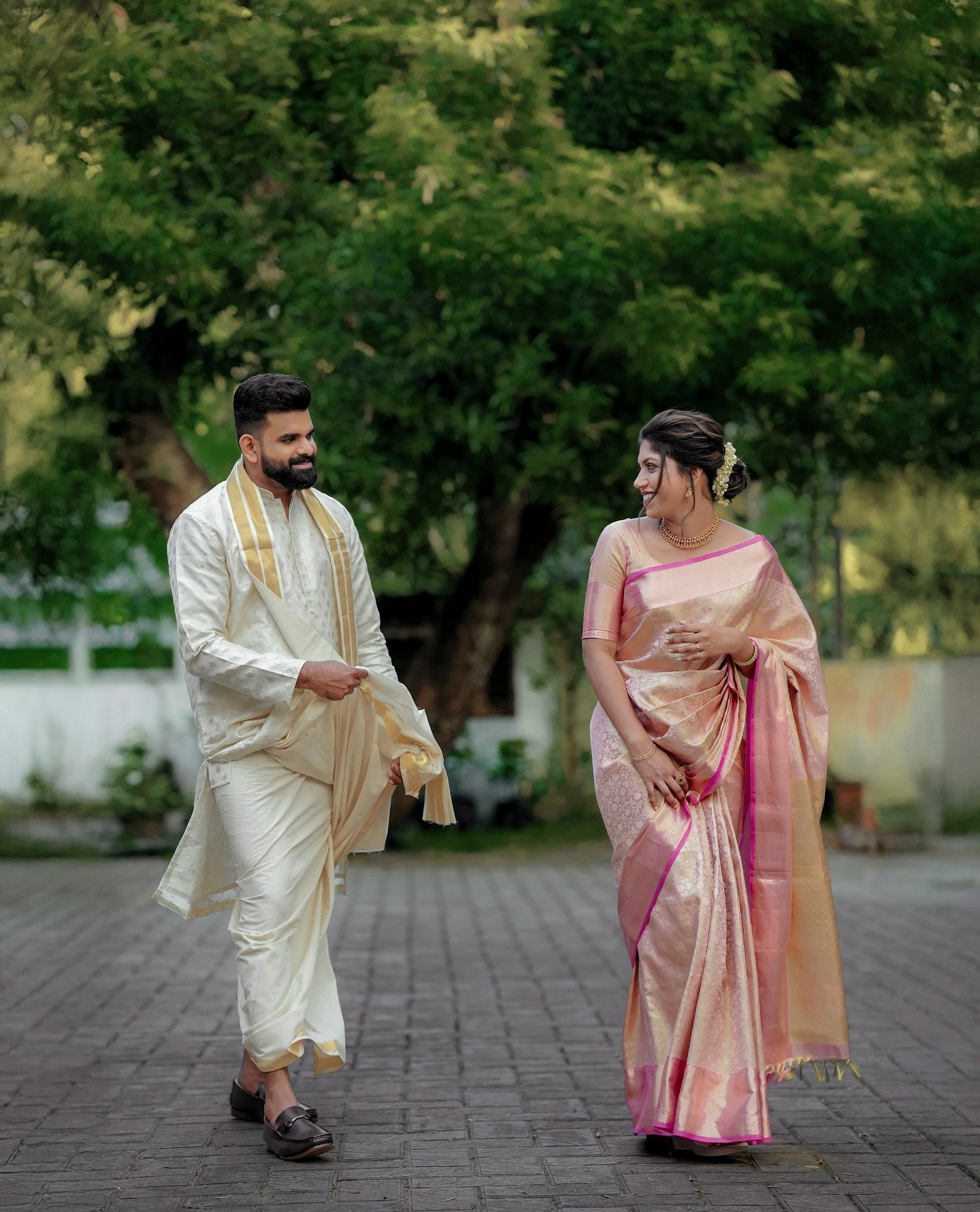 Couple sharing a smile during their outdoor portrait session